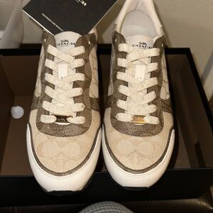 New never worn women’s size 9 tan/taupe Coach tennis shoes.
